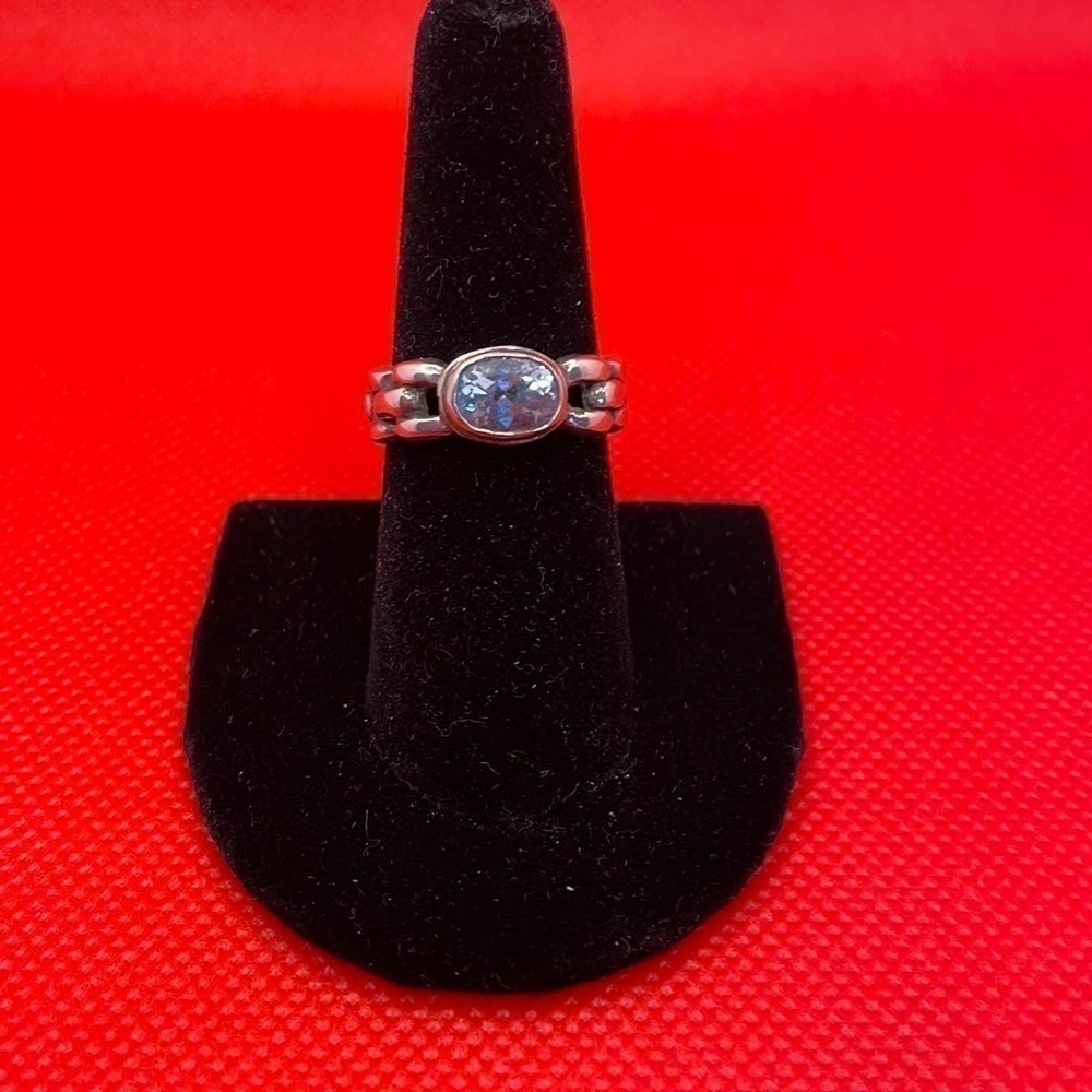 STERLING Silver ring with light blue stone.